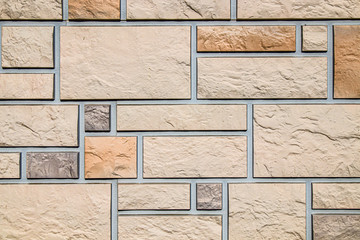 Artificial stone on the wall as background
