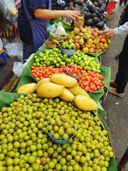 Fruit stall in the Chaingmai city market,  Assortment of fresh fruits at market