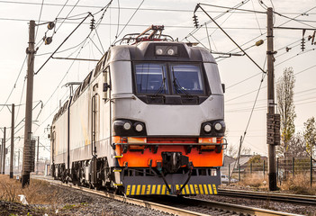 Fototapeta na wymiar Modern electric locomotive on the railway.