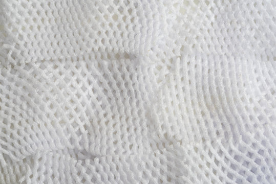 White reticulated styrofoam waste packaging background texture