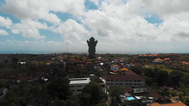AERIAL: Flying towards the Garuda Wisnu Statue in Bali, Indonesia 4K