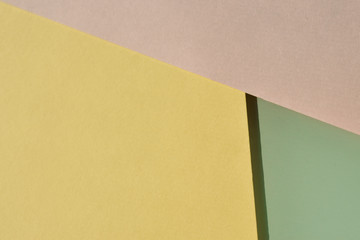 pastel ,soft two tone color of pink and yellow green,  paper as texture fashion background, flat lay