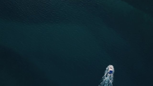 Deep sea fishing boat trip at sunrise at Watamu, Malindi, Kenya. Top down aerial drone view