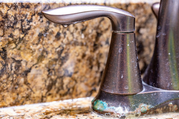 corroded and rusted rubbed oil bronze bathroom faucet