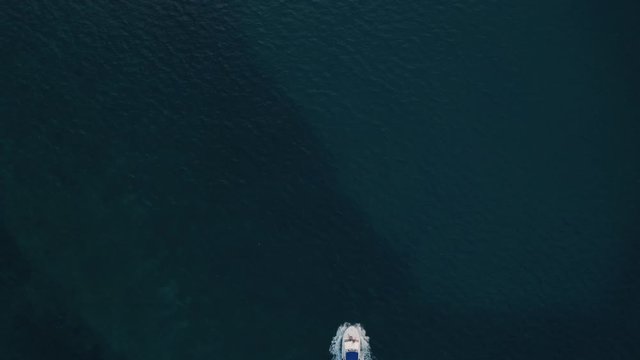 Deep sea fishing boat adventure at sunrise at Watamu, Malindi, Kenya. Top down aerial drone view