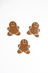 Three gingerbread man cookies