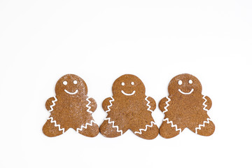 Three gingerbread man cookies
