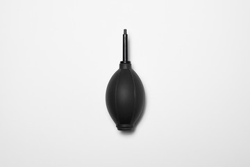 A Dust Blower Mock up on a white background. It's used for cleaning camera lenses or computer equipment.High resolution photo.Top view.