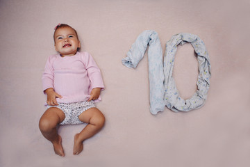 little baby. Figure denoting age. The concept of growing up, IVF, and childhood