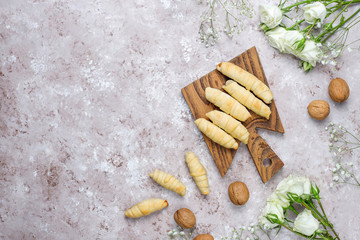 Traditional Azerbaijan holiday Novruz cookies mutaki on white plate on light background
