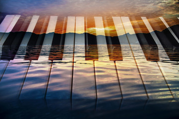 classical music background photo double exposure of piano keys and sunset of a sea landscape creative