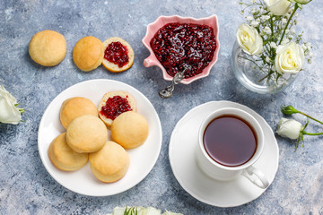 Obraz na płótnie Canvas Homemade delicious cookies serving with raspberry jam,top view