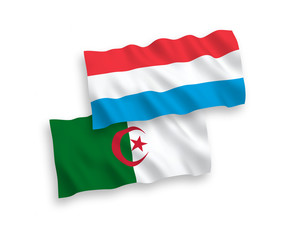 Flags of Algeria and Luxembourg on a white background