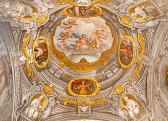 Fototapeta na wymiar FERRARA, ITALY - JANUARY 30, 2020: The fresco of Madonna among the angels from ceiling of church Basilica di San Giorgio fuori le mura by Francesco Ferrari 18. cent.