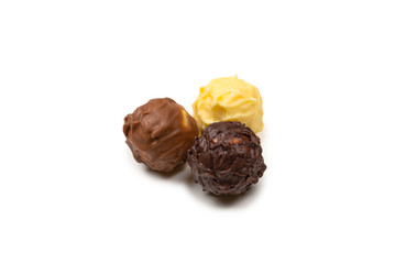 Chocolate truffle isolated on white background.