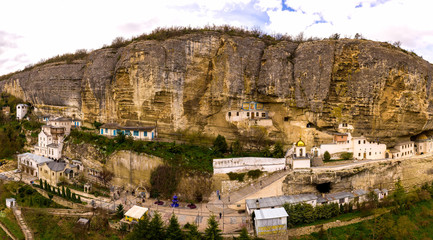 Obraz premium Famous Assumption Monastery of the Caves also known as Bakhchisaray Cave Monastery. Panoramic aerial view