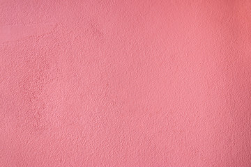 Abstract pink concrete cement wall texture and background.