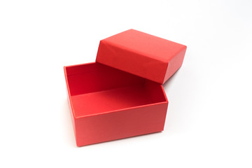 Red open empty box with a lid on a white background. Packaging. Gift.