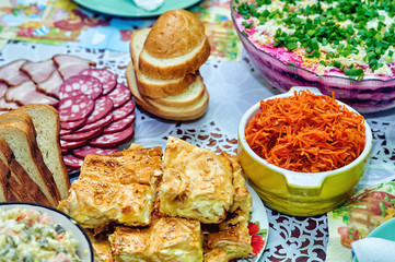 Delicious homemade food on the table . Variety of home-made dishes