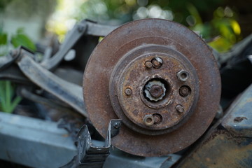 Junk yard full of car's part , engine , body.