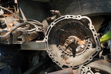 Junk yard full of car's part , engine , body.