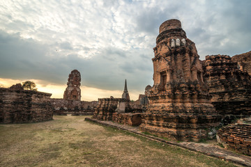 The scenery of the Wat Mahathat temple in cloudy day in Ayutthaya, Thailand.