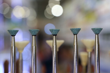 Grinding head. Engraver. Engraving tool. Tool for the manufacture of dentures. Dental equipment.