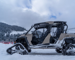 The image of the ATV with a tracked system.