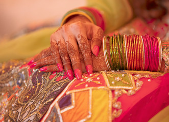 Fototapeta premium Popular mehndi Design on hands of bride 