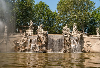 Fototapeta na wymiar View of Fountain of the 12 Months on Valentino park. The project of the architect Carlo Ceppi (1829-1921). Sculptural groups representing the rivers of Turin: Po, Dora, Sangone and Stura.