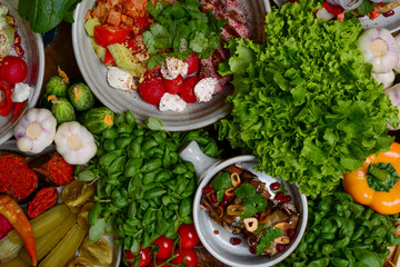 Presentation of georgian cuisine. Baked mushrooms with suluguni cheese, Tbilisi Caesar, caprese, lavash bread, Pkhali