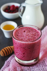 Berry fruits smoothie with vegan milk and honey, summer dessert for well being and healthy lifestyle