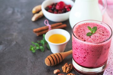Berry fruits smoothie with vegan milk and honey, summer dessert for well being and healthy lifestyle