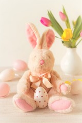 beautiful easter table decoration with  eggs ,rabbits and flowers in pastel colors