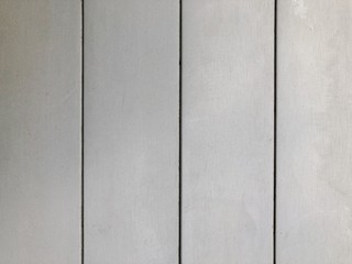 The surface of a gray wooden table.