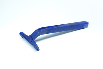 Disposable razor isolated on a white background. Razor for shaving leg hair. The razor is blue as a template.