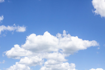 Obraz na płótnie Canvas Cloud in the blue sky. A beautiful clouds against the blue sky background. Beautiful cloud pattern in the sky.