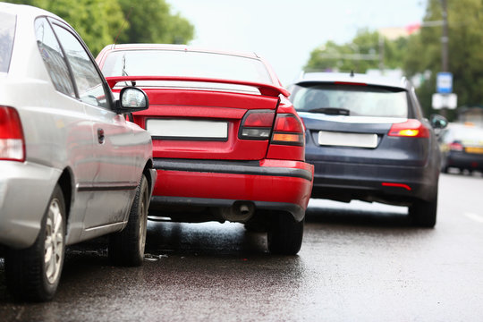 Accident of red and silver car after rain damage failure to keep distance safe distance