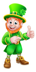 A Leprechaun St Patricks Day cartoon character mascot giving a thumbs up and pointing