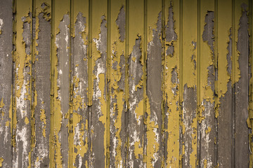 Texture of an old garage losing the paint