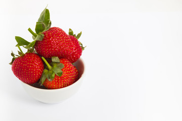 bowl with strawberries isolated on white background
