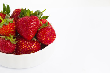 bowl with strawberries isolated on white background