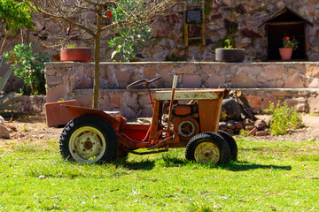 an old retro tractor as a agriculture vehicle
