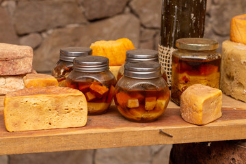 Cheese with raclette in ripening cellar