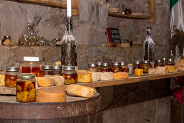 Cheese with raclette in ripening cellar