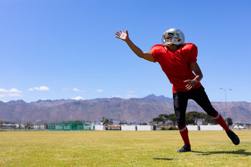 Naklejka premium Football player playing football