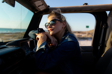 Woman relaxing in a car