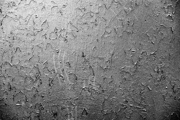 Texture of a metal wall with cracks and scratches which can be used as a background