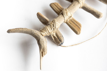 wood-made fish on a white background