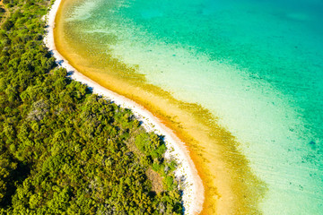 Croatia, Adriatic paradise, secret beaches on Dugi Otok island and pine woods from drone